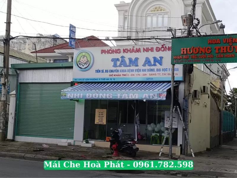 Mái hiên quay tay cửa hàng thuốc